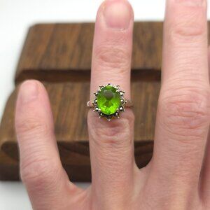 Size 5 925 Sterling Silver Green Glass Surrounded By Marcasites Ring